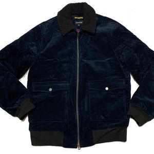 M  / The Sherpa Collar Bomber